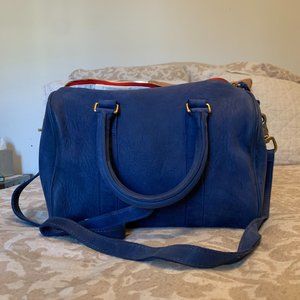 Royal blue Clare V mini duffle with red zipper